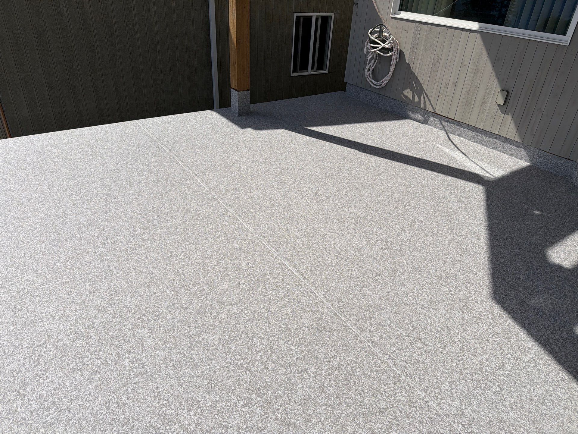 Valordek Flint Taupe vinyl decking membrane on a residential deck