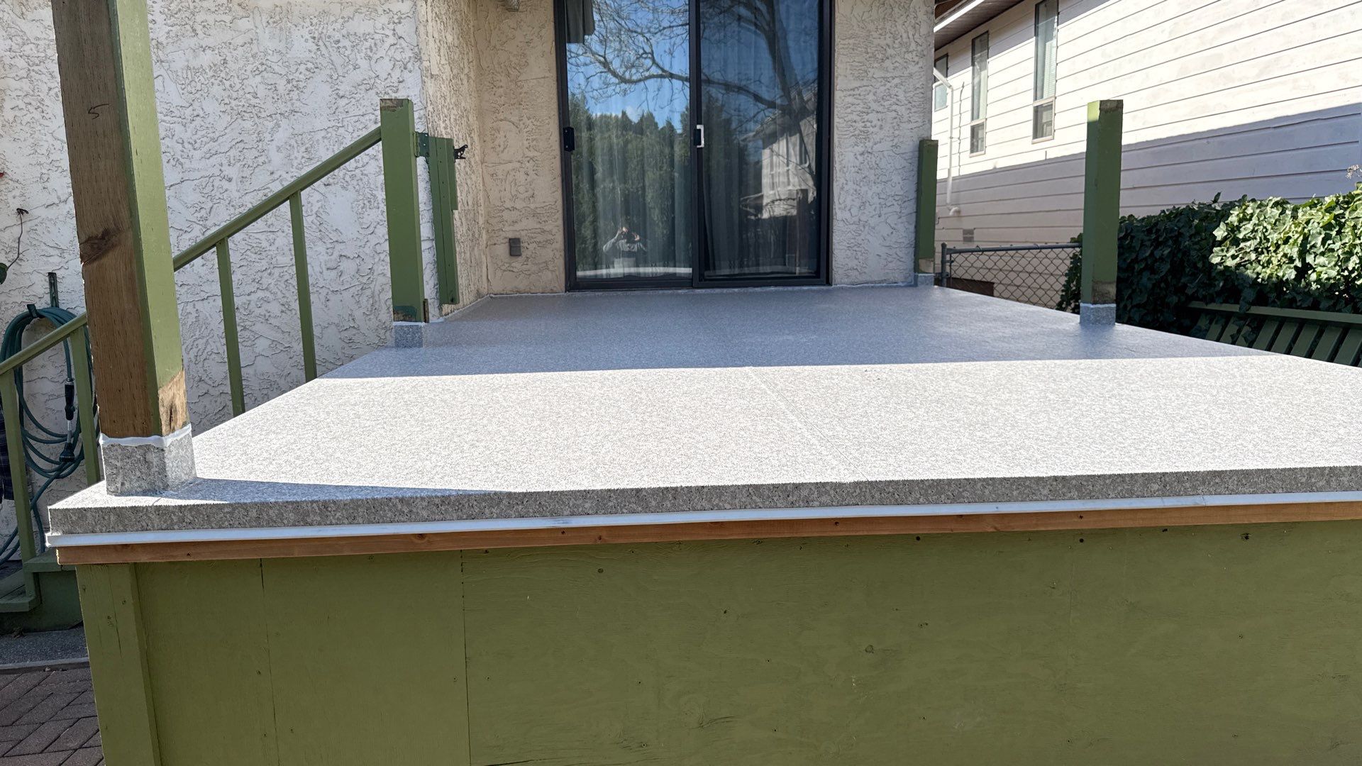 Flat Valordek Grey Stone vinyl decking membrane in direct sunlight with a clean heat-welded seam